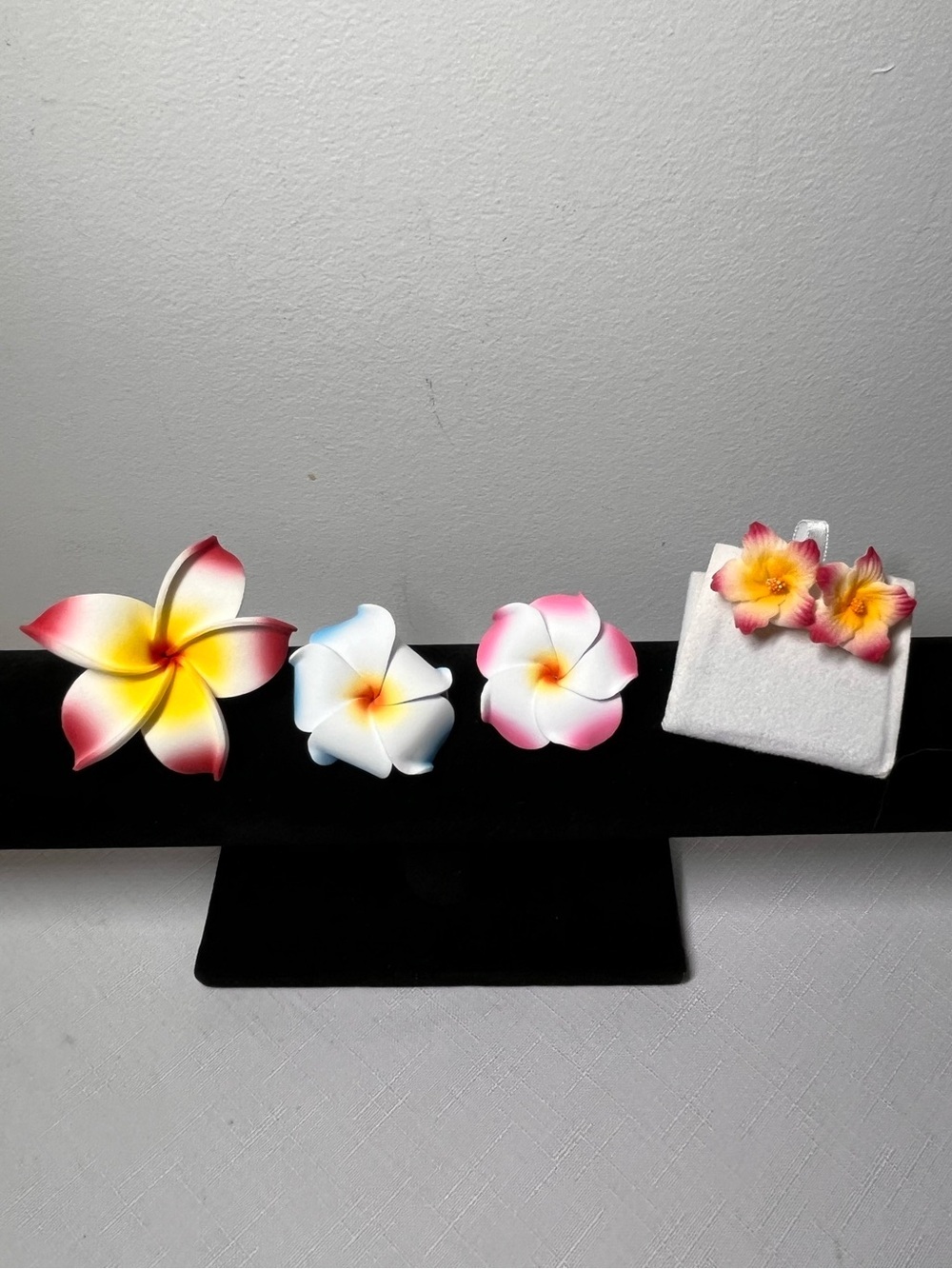 3 Hawaiian Plumeria flower hair clips & 1 pair earrings, soft foam. Lightweight.